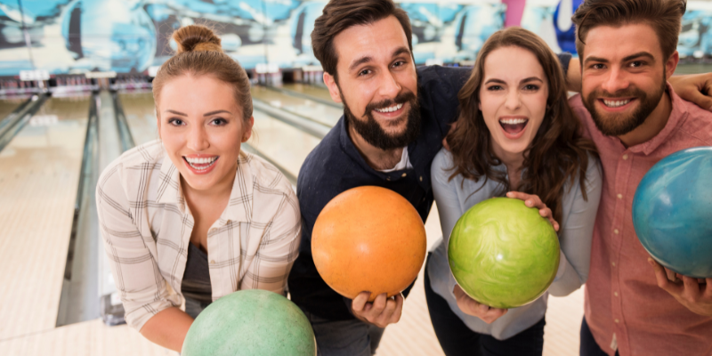 Group of friends bowling